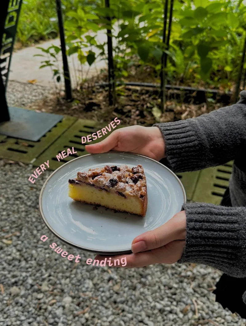 A slice of crumble cake on a plate